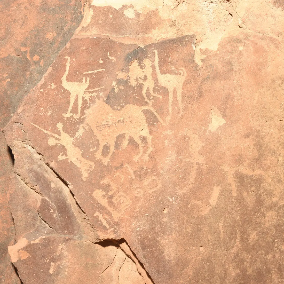 Sandstone panel with petroglyphs and Ancient North Arabian (Hismaic) inscriptions